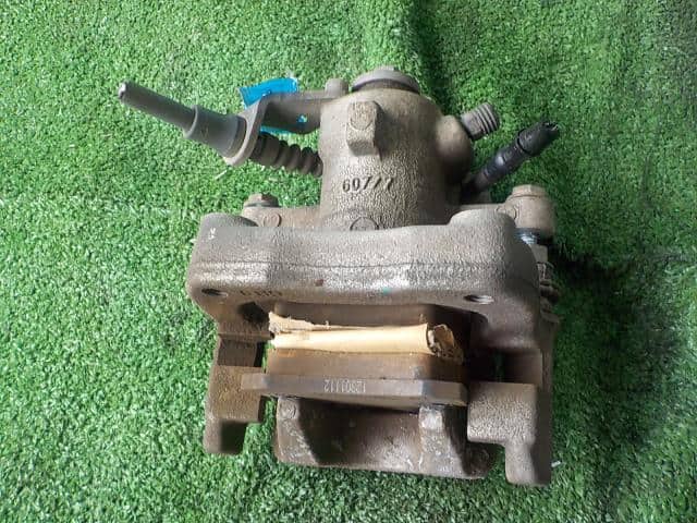 Rear Left Caliper VOLKSWAGEN Polo 2014 DBA-6RCJZ — photo 2