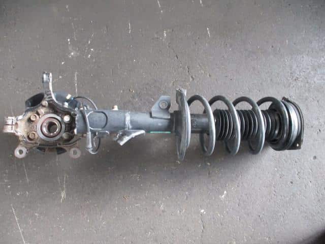 Front Left Strut Assembly NISSAN Serena 2008 DBA-C25 — photo 1