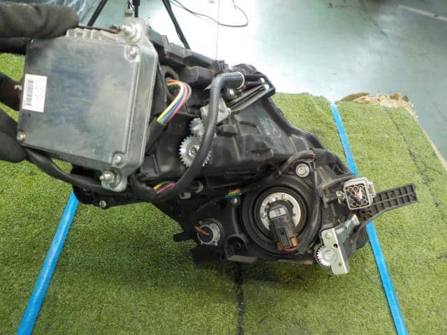 Left Headlight MITSUBISHI i-MiEV 2010 ZAA-HA3W — photo 2