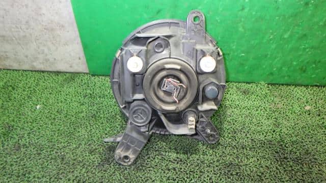 Left Headlight DAIHATSU Move 1998 GF-L900S — photo 2