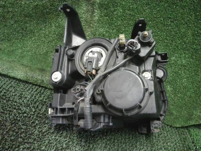 Left Headlight MITSUBISHI Toppo 2010 DBA-H82A — photo 4