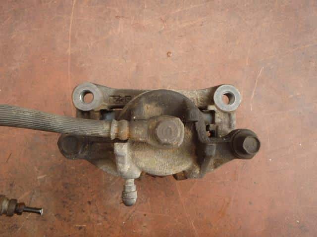 Front Left Caliper MITSUBISHI Minicab 2005 GBD-U62 — photo 2