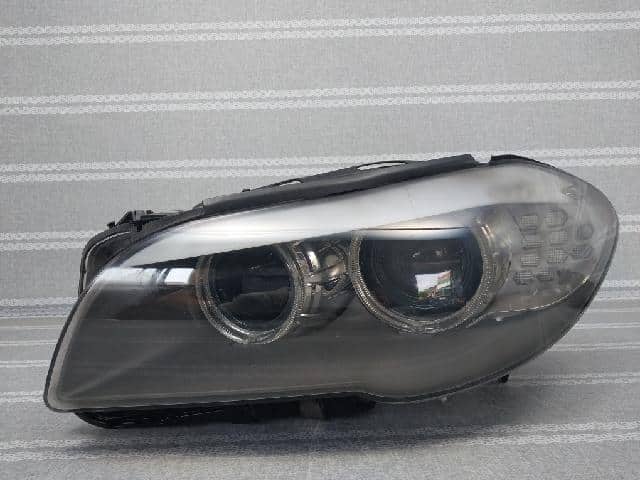 Left Headlight BMW 2010 1ZS 010 131-51 — photo 1