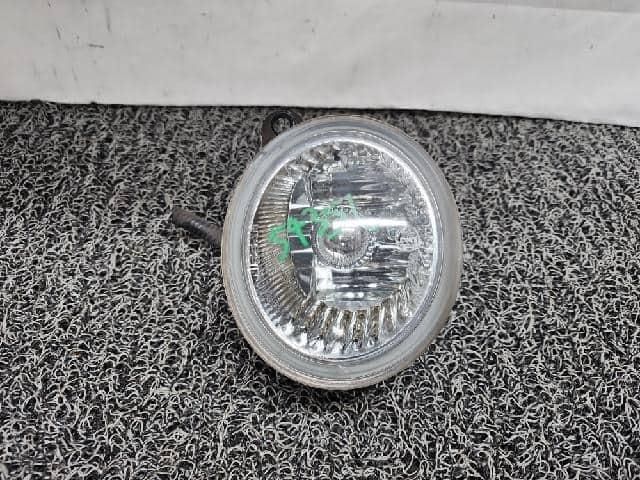 Left Fog Light NISSAN Cube 2003 — photo 1