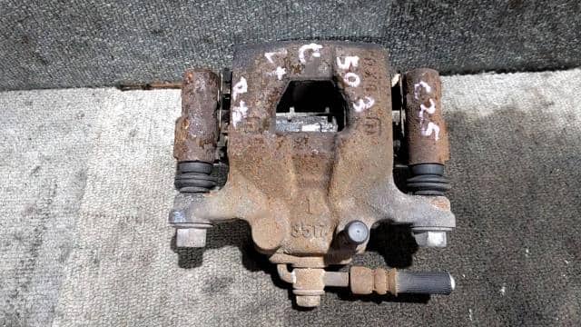 Rear Left Caliper NISSAN Serena 2009 DBA-C25 — photo 1