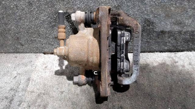 Rear Left Caliper NISSAN Serena 2009 DBA-C25 — photo 2