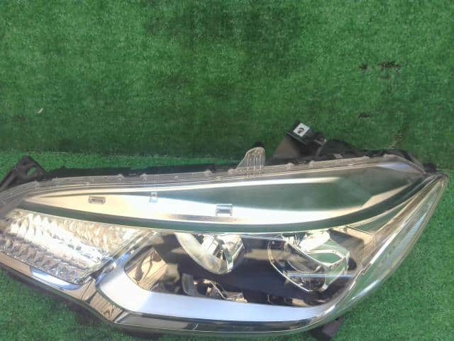 Left Headlight HONDA Fit 2013 DAA-GP5 — photo 2