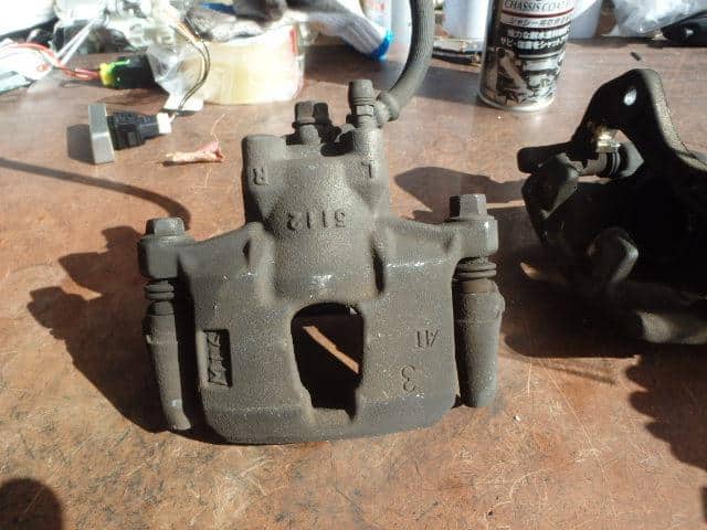 Front Left Caliper DAIHATSU Mira 2009 DBA-L275S — photo 3