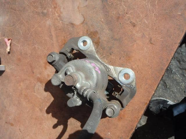 Front Left Caliper DAIHATSU Mira 2009 DBA-L275S — photo 2