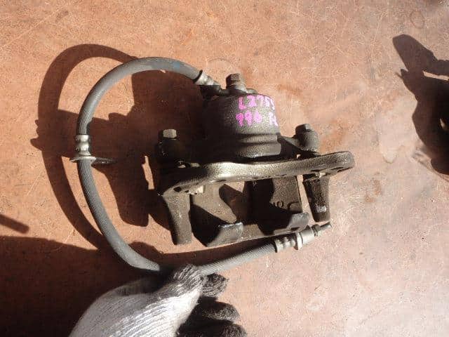 Front Left Caliper DAIHATSU Mira 2009 DBA-L275S — photo 1