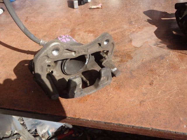 Front Left Caliper DAIHATSU Mira 2009 DBA-L275S — photo 4