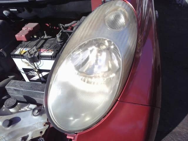 Left Headlight NISSAN March 2004 CBA-AK12 — photo 1
