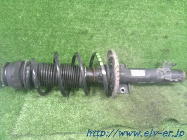 Front Left Strut VOLKSWAGEN Polo 2011 ABA-AWDAD 6R0413031AJ — photo 1