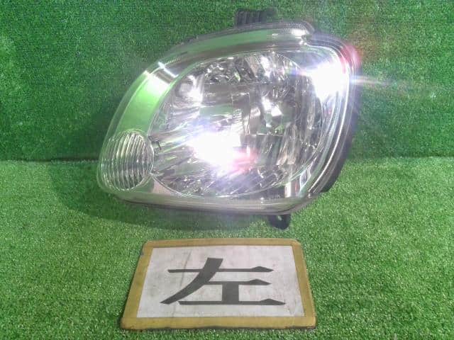 Left Headlight SUBARU Pleo 2009 EBD-RV1 — photo 1