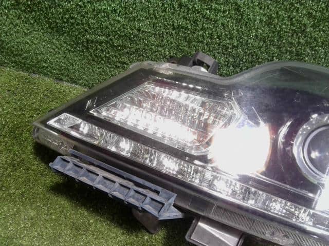 Left Headlight SUZUKI Solio 2012 DBA-MA15S — photo 6