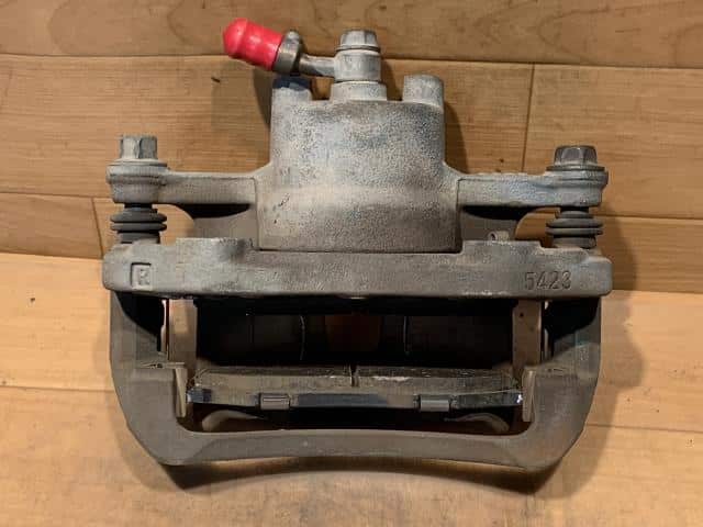 Front Left Caliper NISSAN March 2003 UA-AK12 — photo 2