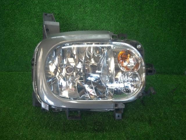 Left Headlight NISSAN Cube 2008 DBA-YZ11 — photo 1