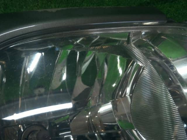 Left Headlight NISSAN Cube 2008 DBA-YZ11 — photo 4