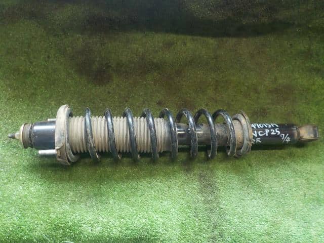 Rear Right Strut TOYOTA Fun Cargo 2004 CBA-NCP25 4853080137 — photo 1