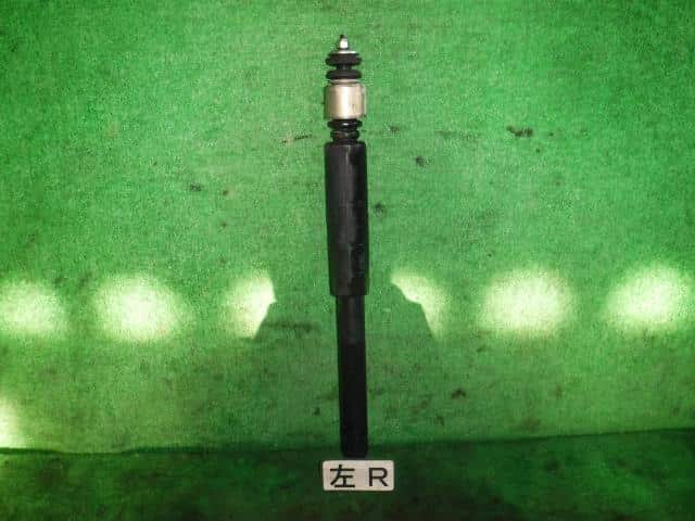 Rear Left Shock Absorber NISSAN Wingroad 2009 DBA-Y12 — photo 1