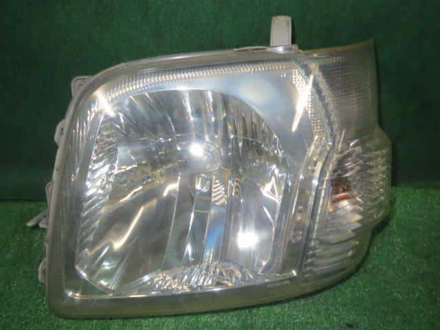 Left Headlight DAIHATSU Hijet 2005 LE-S330V — photo 1