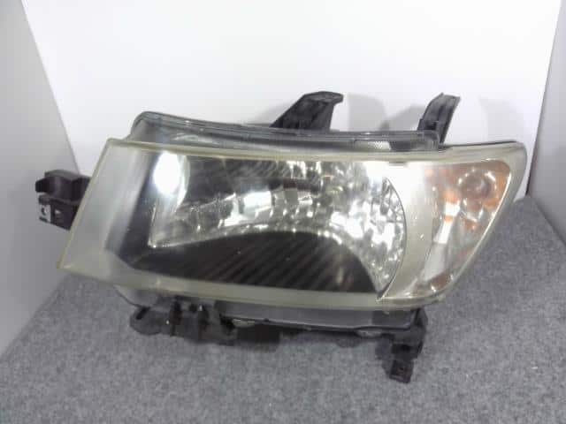 Left Headlight TOYOTA bB 2007 DBA-QNC21 — photo 1