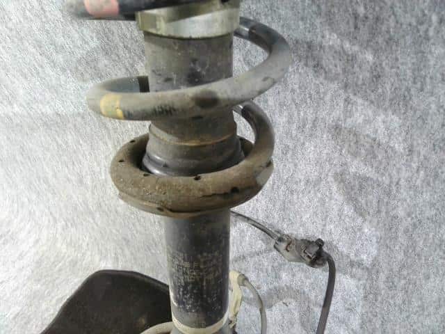 Front Left Strut Assembly TOYOTA bB 2007 DBA-QNC21 — photo 8
