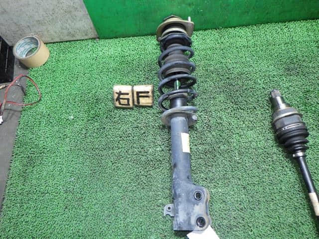 Front Right Strut DAIHATSU Mira 2002 LE-L250V — photo 1