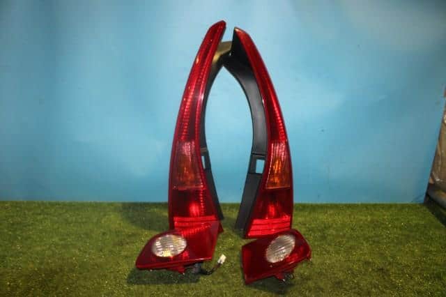 Left Tail Light NISSAN Stagea 2005 GH-NM35 26555AQ025 — photo 1