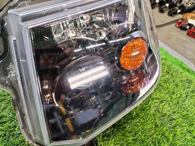 Left Headlight MITSUBISHI eK Sport 2008 CBA-H82W — photo 2