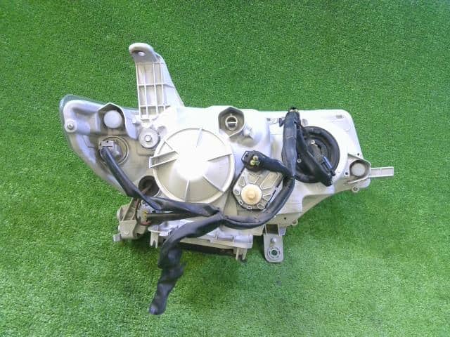 Left Headlight DAIHATSU Tanto 2010 DBA-L375S — photo 3