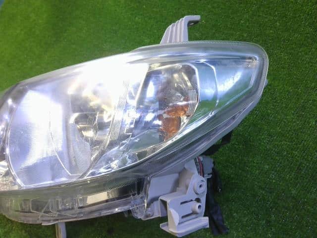 Left Headlight DAIHATSU Tanto 2010 DBA-L375S — photo 2