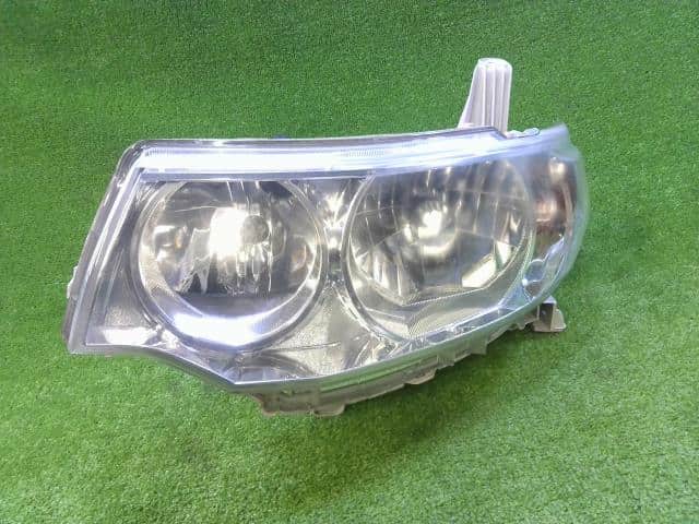 Left Headlight DAIHATSU Tanto 2010 DBA-L375S — photo 1