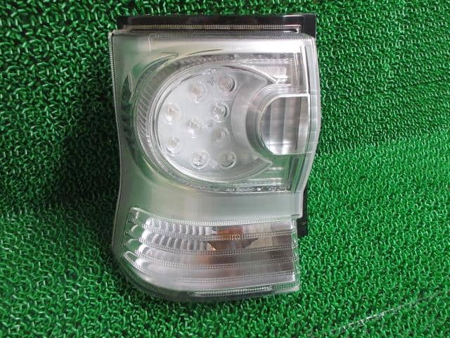 Left Tail Light DAIHATSU Tanto 2012 DBA-L385S — photo 1