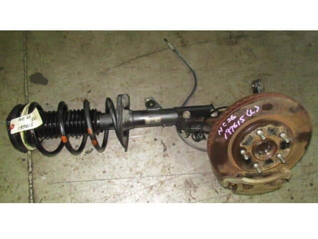 Front Left Strut Assembly NISSAN Serena 2012 DBA-NC26 — photo 1