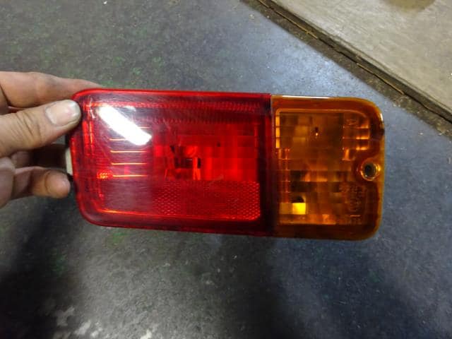 Left Tail Light DAIHATSU Hijet 2014 EBD-S211P — photo 1