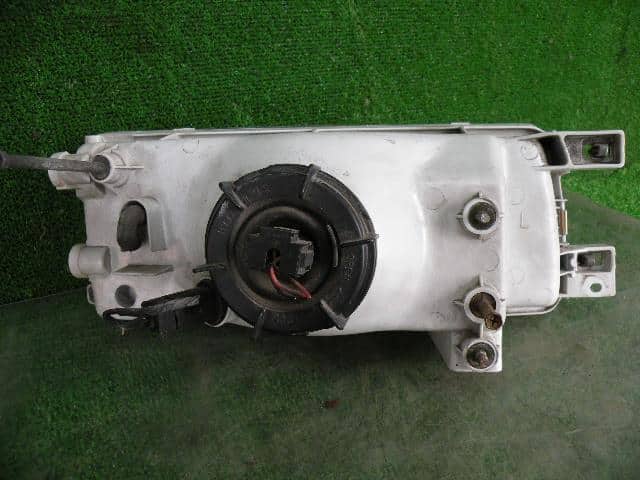 Left Headlight NISSAN Sunny 1991 E-FNB13 1299 — photo 2
