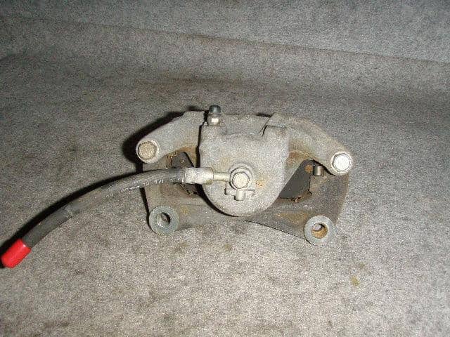 Front Left Caliper NISSAN Teana 2006 CBA-PJ31 — photo 2