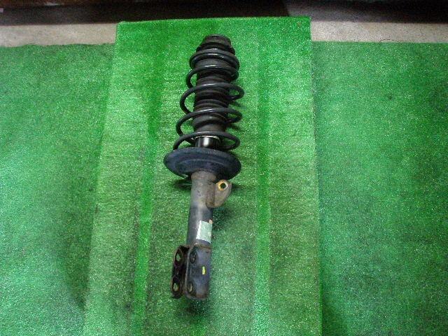 Front Right Strut TOYOTA Vitz 2005 DBA-SCP90 — photo 1