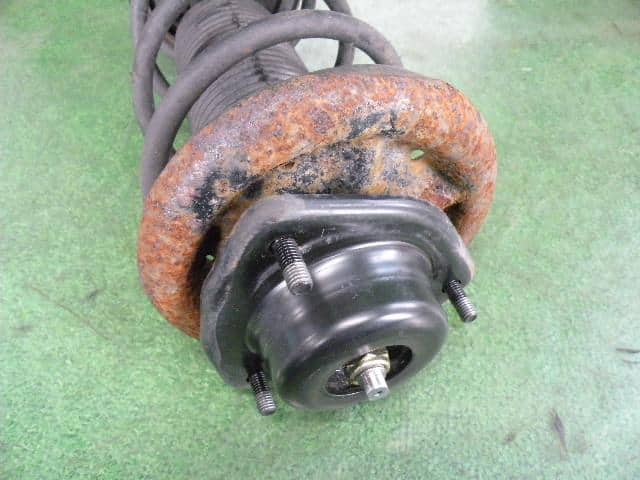 Rear Left Strut NISSAN Sunny 2000 GF-FNB15 — photo 1
