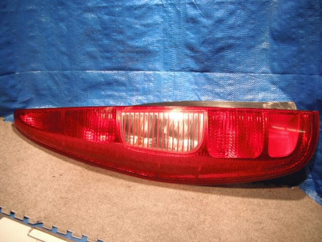 Left Tail Light MITSUBISHI Colt 2002 UA-Z27A — photo 1
