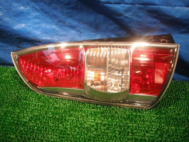 Left Tail Light TOYOTA Passo 2005 DBA-QNC10 — photo 1