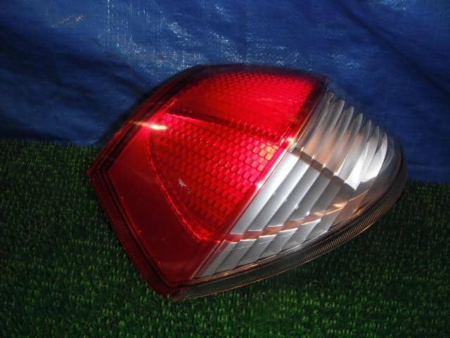 Left Tail Light SUZUKI Solio 2011 DBA-MA15S — photo 2