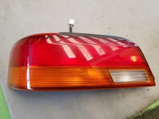 Left Tail Light TOYOTA Corolla Levin 1996 E-AE111 — photo 1