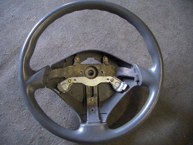 Steering Wheel MAZDA Carol 1999 GF-HB12S — photo 1