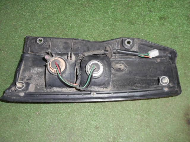 Left Tail Light SUZUKI Jimny 1998 GF-JB23W 3567081A00 — photo 4
