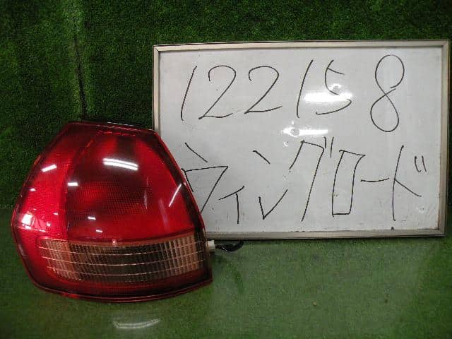Left Tail Light NISSAN Wingroad 2002 TA-WFY11 — photo 1