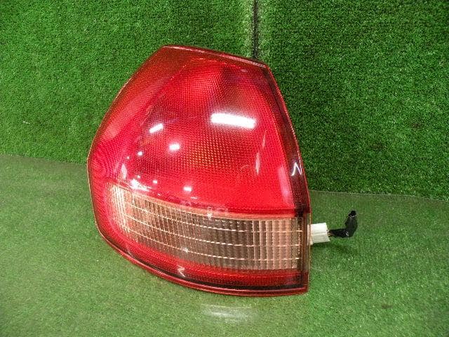 Left Tail Light NISSAN Wingroad 2002 TA-WFY11 — photo 2