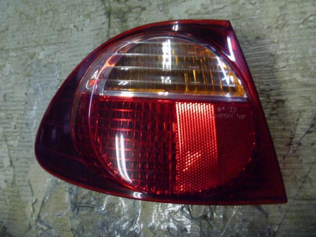 Left Tail Light TOYOTA Caldina 1999 E-ST215 — photo 1