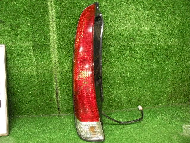 Left Tail Light TOYOTA Cami 2000 GF-J102E — photo 2